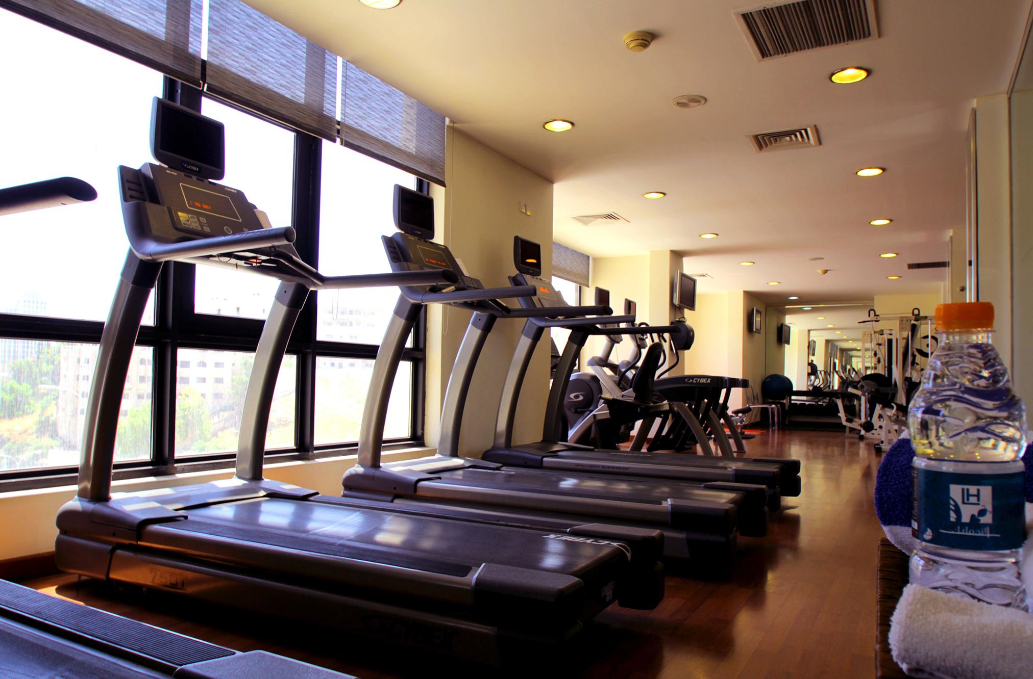 Landmark Amman Hotel & Conference Center Exterior photo A row of treadmills