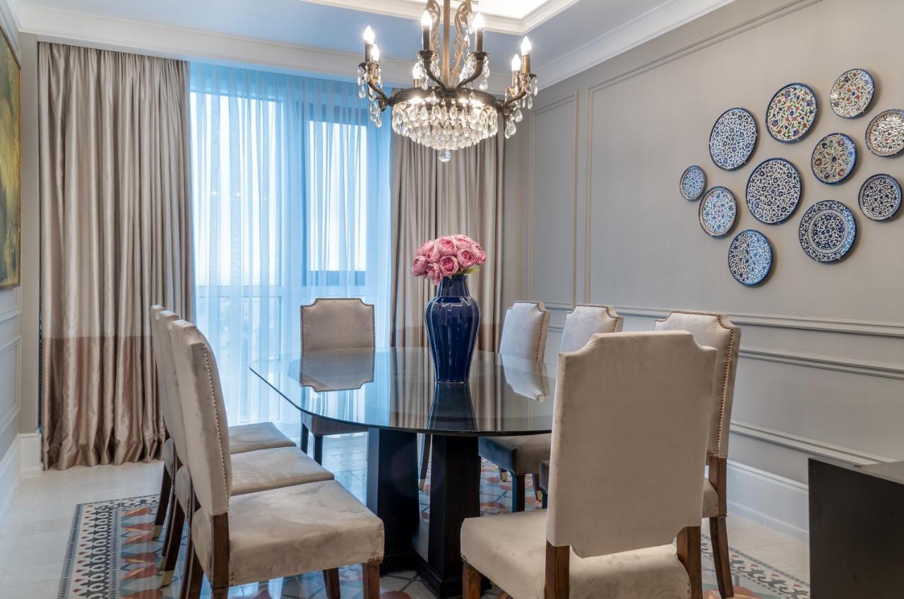 Landmark Amman Hotel & Conference Center Exterior photo A dining room in a luxury apartment