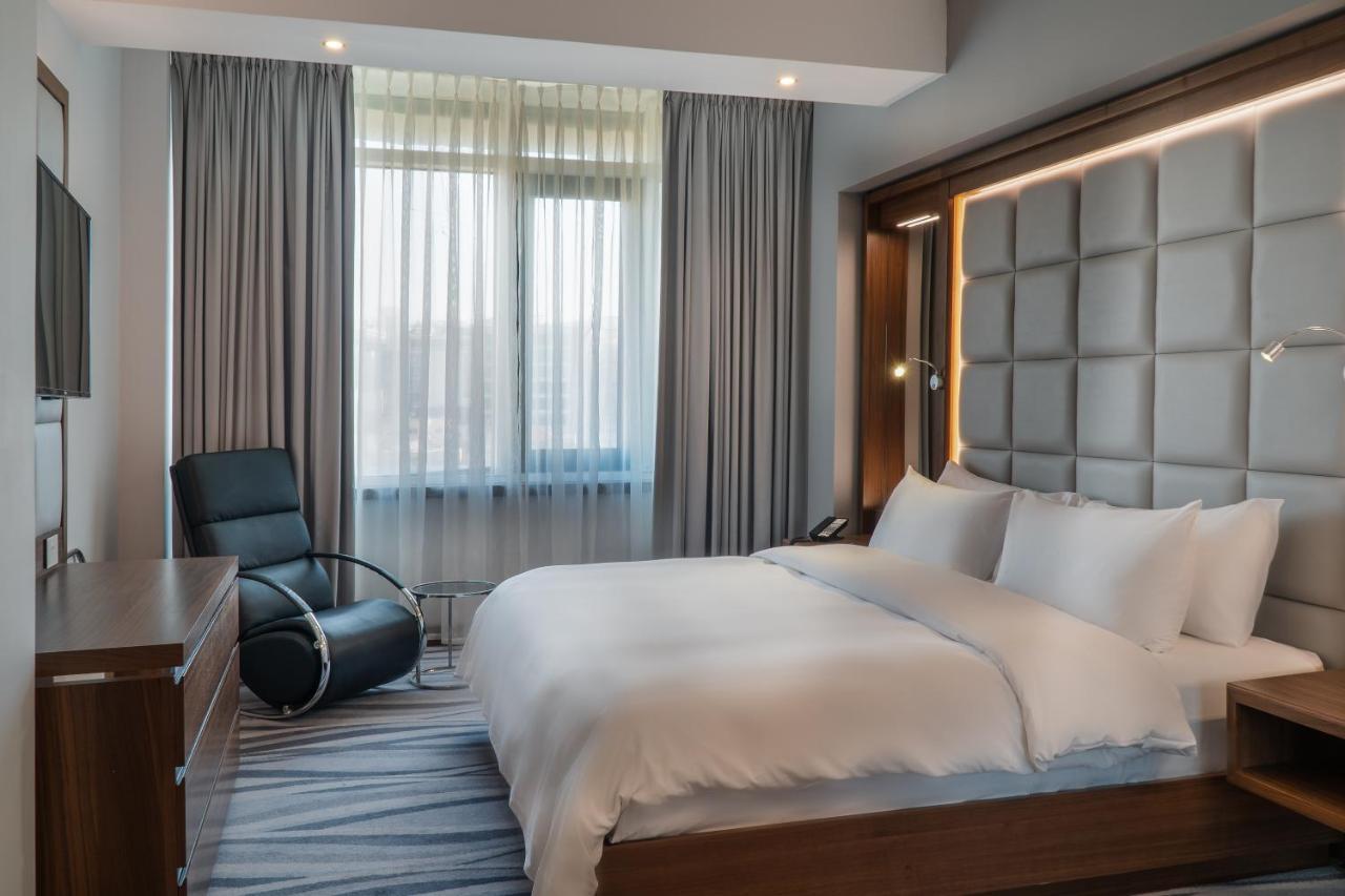 Landmark Amman Hotel & Conference Center Exterior photo A bedroom at the hotel